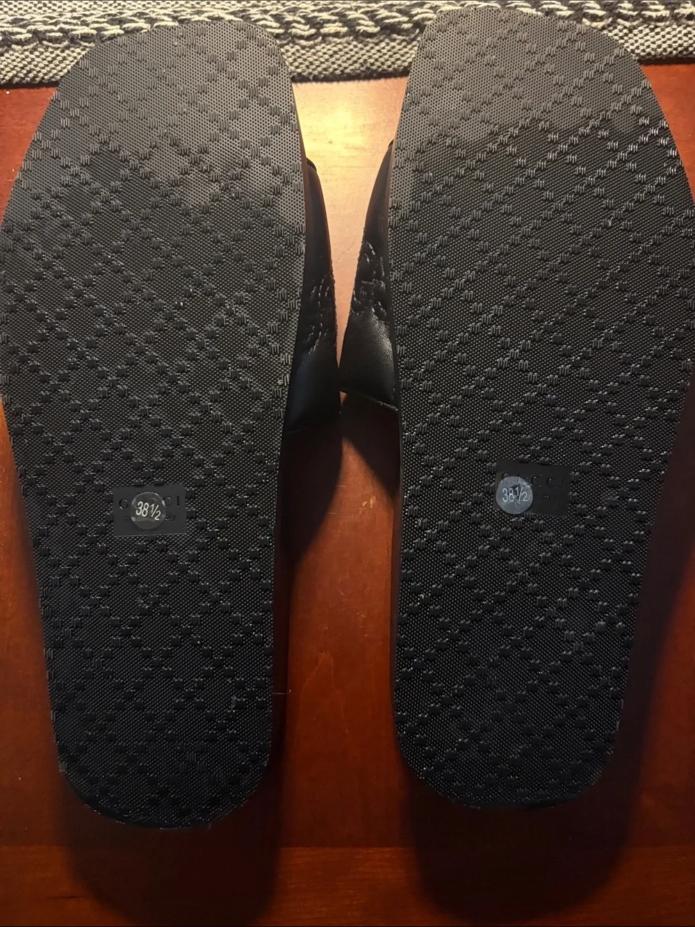 Gucci Black Embossed Logo Slide Sandals